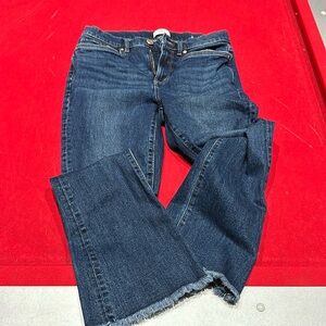 Ann Taylor loft outlet flare crop jeans with frayed bottoms. 27/4